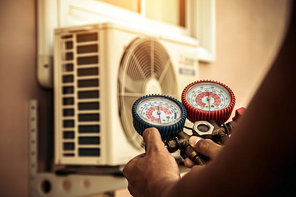 Professional Heat Pump Repair technician working in Barberton, WA